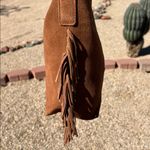 Haute Hippie | Honey Tan Suede Bucket Bag w/ Fringe and Adjustable Buckle Photo 7