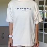 Guess Vintage 90s Women’s T-shirt in Light Yellow Photo 5