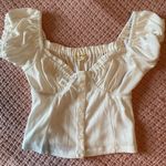 Grey Bandit White Top Photo 1