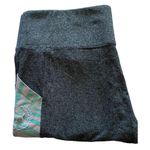 PINK - Victoria's Secret  YOGA-GRAY AND FLORAL LEGGINGS  Gray yoga leggings with floral and white sides, side pockets, great condition, size large Measurements:  Waist: side to side 16-19 inches  Rise: 10 inches  Inseam: 29 inches  Photo 0