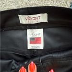Vibrant Black Leather Flare Pants Photo 2