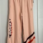 Free People Movement FP MOVEMENT BY FREE PEOPLE ALL STAR LOGO SWEATPANTS SIZE L MSRP $98.00 Photo 4