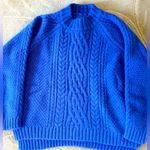 Women’s thick and warm bright blue sweater
size 4 Photo 0