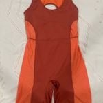 Fabletics romper terra-cotta/ coral Photo 1