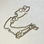 Long silver tone necklace with circles Photo 2