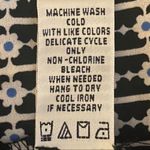 Max Studio black and cream romper with 3/4 sleeves and shorts. Size Small. EUC Photo 8