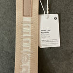 Lululemon  Athletica Beige never lost Keychain Photo 0
