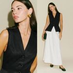 Reformation  | Oakley Peplum Collared Fitted Vest with Velvet Buttons in Black Photo 1