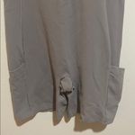 Aritzia TNAction Breathe Icon Romper Zippered High Neck Taupe Size Small Tan Photo 5