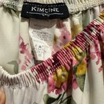 Francesca's Off the shoulder floral ruffled hem romper Photo 2