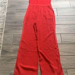 Diane Von Furstenberg  red jumpsuit Photo 5