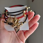 Adjustable steel bracelet with charm. Gold Photo 2