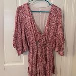 INDIKAH Pink and White Floral Romper with Ruffled Sleeves Photo 1