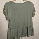 Francesca's teal peplum top Photo 1