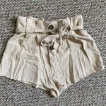 Mustard Seed high waisted tan / beige paper bag shorts with button front Photo 1