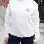 Brandy Melville JOHN GALT Women’s Angel/Devil Embroidered Crewneck Sweatshirt Photo 0
