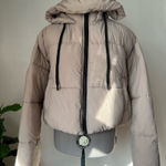 Forever 21 tan hooded puffer jacket. Photo 0