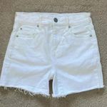 American Eagle  high rise shortie white jean shorts in size 0 Photo 0