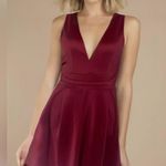 Boohoo  Maroon sleeveless mini dress with skater skirt and deep v neck Photo 0