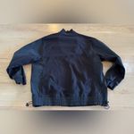 Athleta  Triumph Hybrid Half Zip Sweatshirt black size small Photo 9