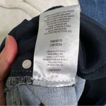 Free People  | Button Fly Skinny Jeans with Distressed Hem Photo 6