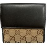 Gucci •  gold heart canvas and leather bifold wallet Photo 7