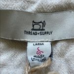 Thread & Supply Cream Button Photo 3
