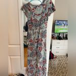 Angie Beautiful patterned romper with flowy skirt. Size S. Photo 2