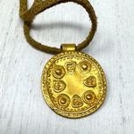 Mayan design gold tone pendant purchased in Costa Rica, on golden suede cord Photo 5