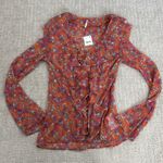 Free People NEW NWT  nina printed top in tulip ditsy orange floral bell sleeve Photo 4