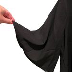 None Black v-neck button front with tie waist and bell sleeves blouse women’s size L Photo 2