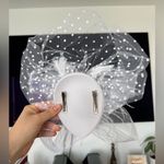 Elegant White Fascinator and Gloves Set Photo 5