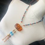 Handcrafted genuine stone faux tortoise medallion necklace Brown Photo 1