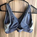 Nike sports bra blue in color size large Photo 3