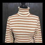 7 Love metallic brown & cream turtleneck sweater- Size Large***refer to measurements for size. Gently Warn and excellent condition. Measurements approximately from armpit to armpit 15” not fully stretched out x 23” long. None smoking home. Priced at as is condition. Don’t like my price make a reasonable offer! And thank you for checking my closet! Photo 3