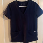 FIGS Navy  Scrub Top Two-Pocket Photo 0