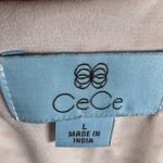 CeCe  red and white dot printed peplum top size large Photo 3