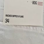 Urban Outfitters  Size 34 White V-Front Flare Jeans Photo 6