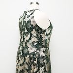 Betsy and Adam . Layla Halter Top Foil Print Gown. Photo 13