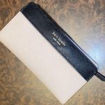 Kate Spade Staci Colorblock Large Slim Bifold in Warm Beige & Black Photo 0