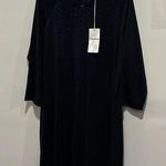 Tommy Bahama Tommy Bahamas black dress with black sparkle embellishment. Size Large Photo 0