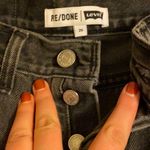 RE/DONE Black Denim Raw Hem Mini Skirt Photo 2