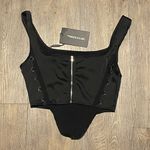 Pretty Little Thing Black Satin Multi Lace Up Dip Hem
Crop Top Photo 3