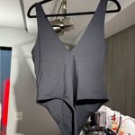 Babaton Aritzia  Contour V-Neck Bodysuit in black Photo 6