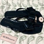BCBGeneration  Glossy Black Jelly Bow Sandals Shoes Lima 7 NWT Photo 2