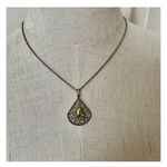 silver and gold tone horse teardrop pendant necklace Photo 2