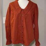 Lost + Wander  canyon clay top in terra cotta. Relaxed fit, low cut collar medium Photo 1