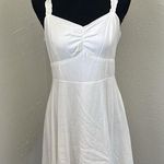 Miami  White Mini Dress w/ Smocked Back and Ruffle Sleeves Photo 0