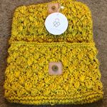 Street Level NWT Woven Clutch Photo 1