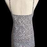 Pretty Little Thing NWT--LEOPARD PRINT DRESS-SIZE 8 Leopard print, ruched bust, shift dress, brand new, 95% polyester and 5% elastane Measurements: Bust: armpit to armpit 14-16 inches Length: shoulder seam to bottom 32 Photo 6